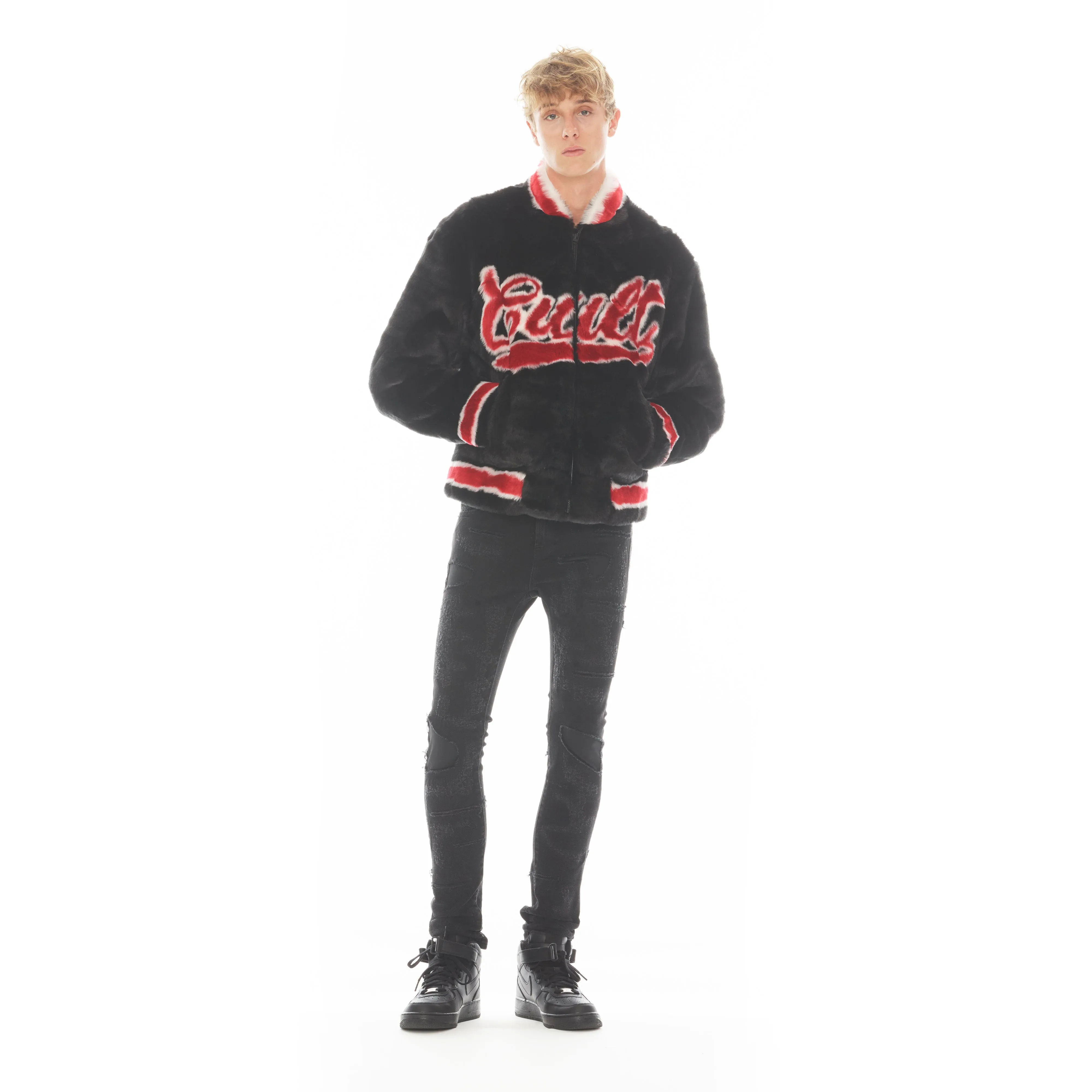 FAUX FUR VARSITY JACKET IN BLACK