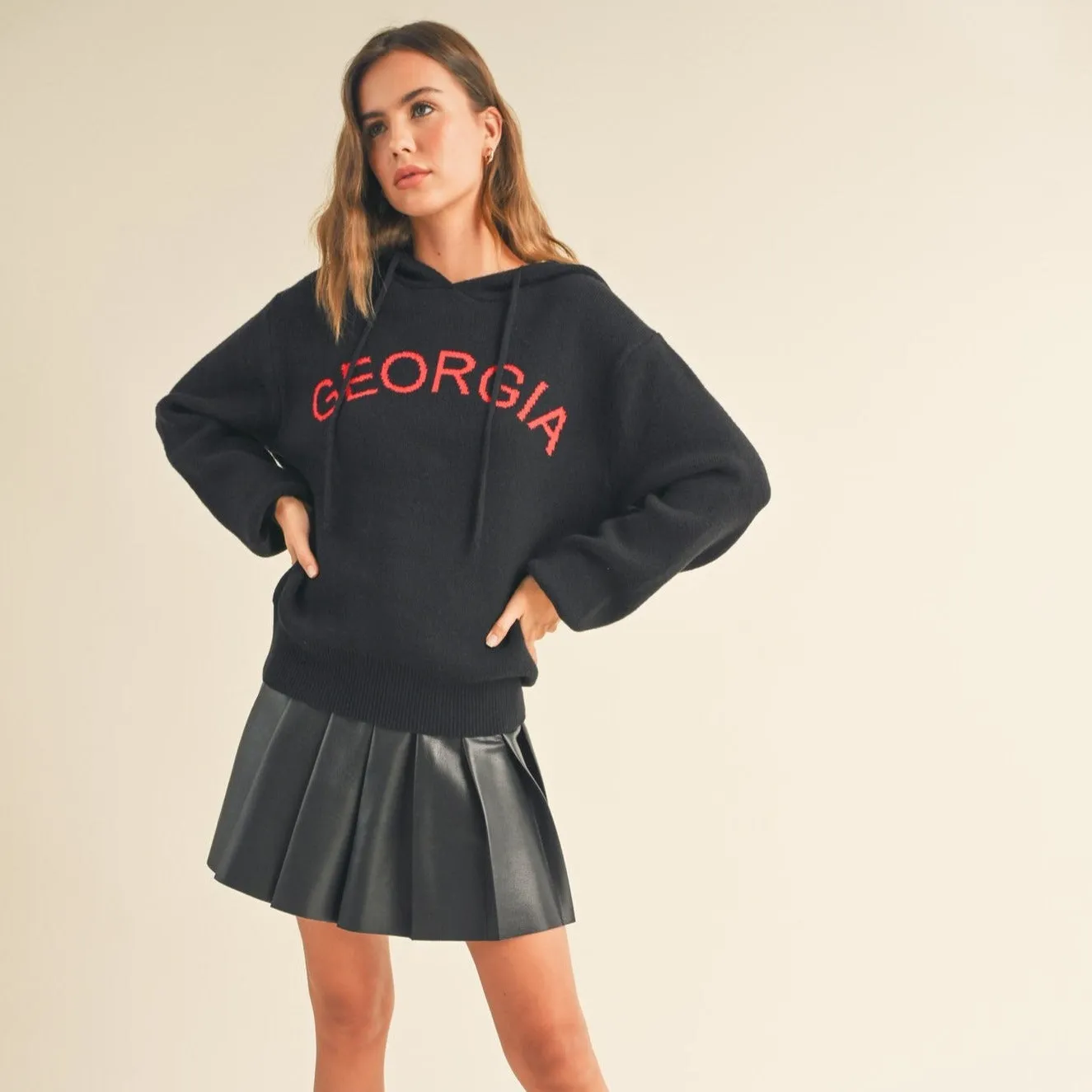 Optimized Title: **Georgia Bulldogs Black Knit Puff Sleeve Hoodie with Red Graphics**