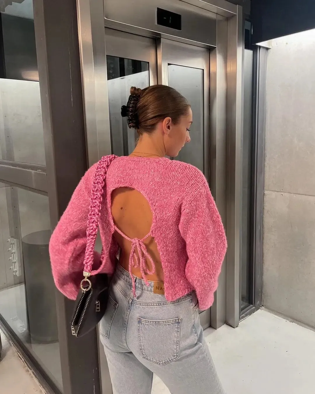 Open back tie pink sweater