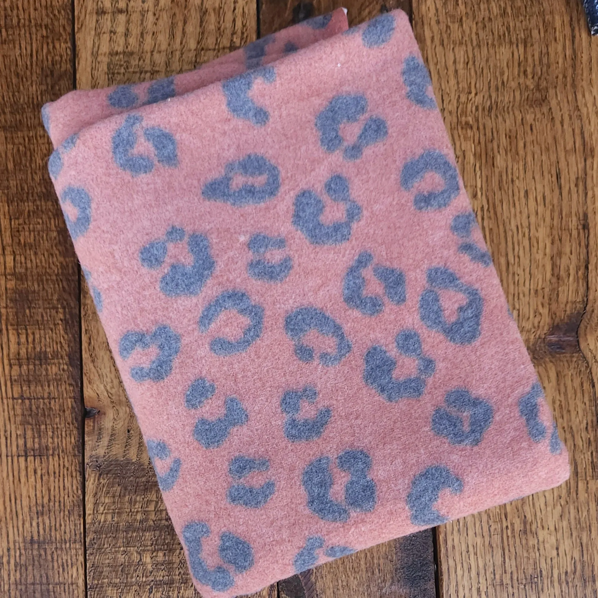 *Rust Animal Print Brushed Sweater Knit Poly Spandex. Last Yards - May not be continuous.